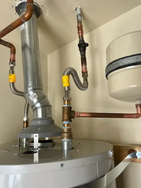 Water heater installation and plumbing repair in The Heights